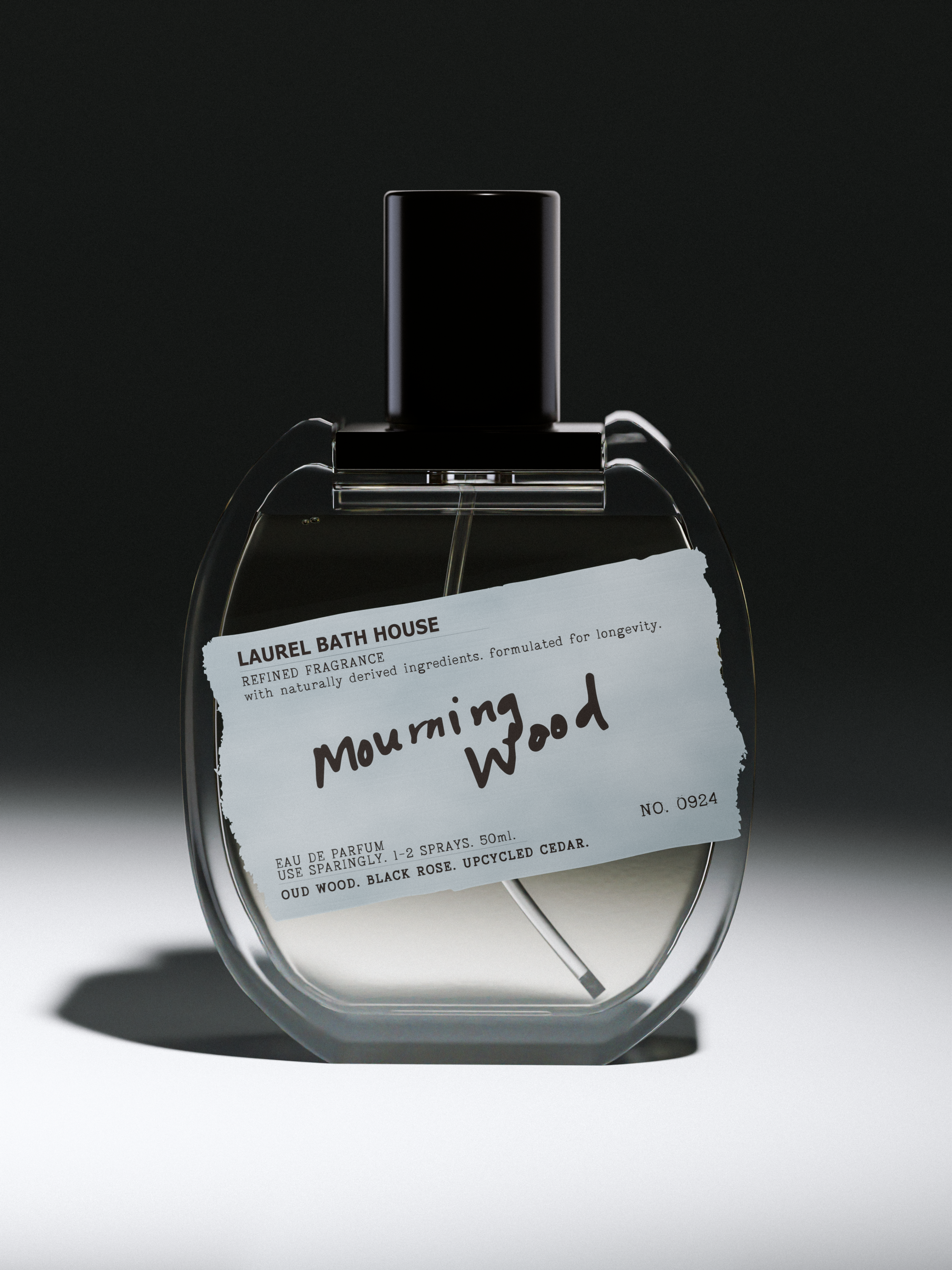 “High-end 3D product render of a perfume bottle with a handwritten label ‘Mourning Wood’